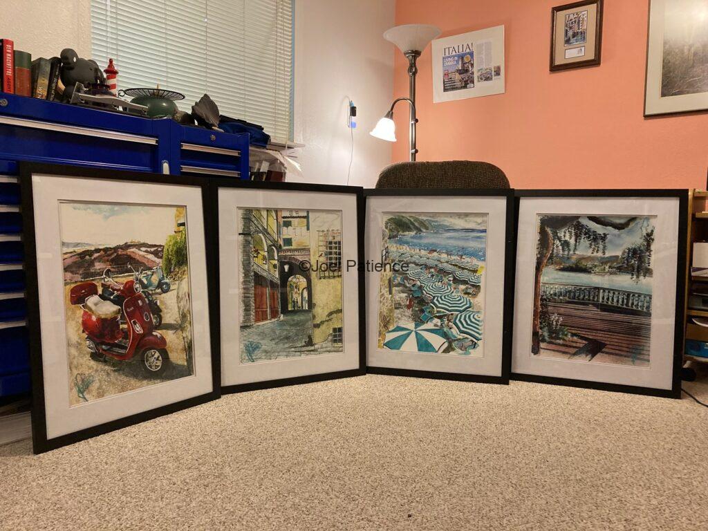 A photograph of four framed watercolor paintings